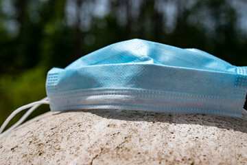 Used Corona Virus mask outdoors