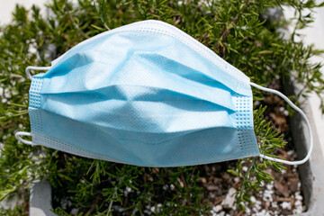 Used Corona Virus mask outdoors