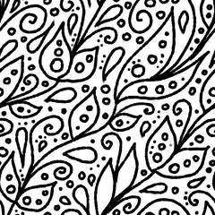 Hand-drawn black and white abstract floral seamless pattern. One color outline texture on white background consists of leaves, circles, dots, swirls and drops. Wrapping paper, scrapbooking, textile.