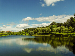Obraz na płótnie Canvas Beautiful natural landscape near a reservoir on a Sunny summer day