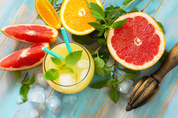 Summer menu drink. Orange and Grapefruit  refreshing drink with ice.