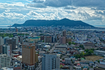 View of downtown Hakodate, in northern Japan, with Mount Hakodate visible on the horizon
