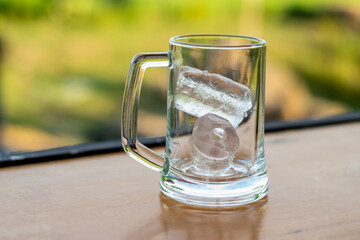 Ice glasses placed on a wooden table