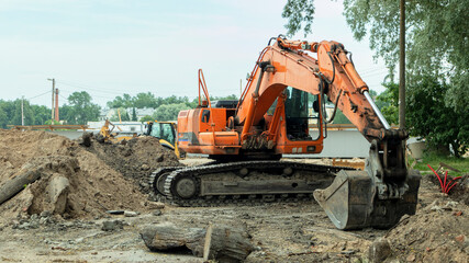 construction excavator near the construction site