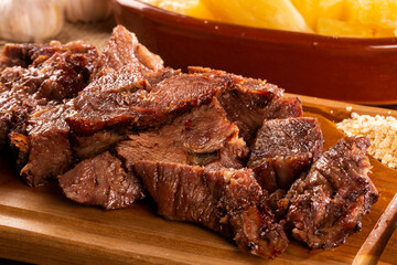 Beef prime rib with manioc and flours.