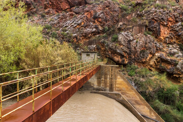 metal footbridge crossing the river