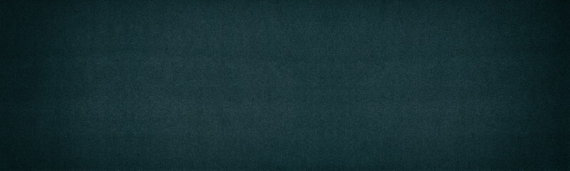 Black paper texture. Dark fine textured surface. Wide gloomy background