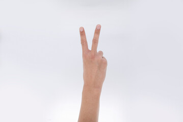 Number two index finger on white background