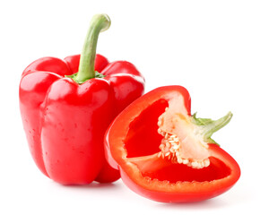Red sweet peppers whole and half on a white background. Isolated