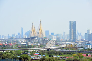Great city view with beautiful hanging bridges that cross the river of Bangkok, Thailand.