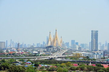 Great city view with beautiful hanging bridges that cross the river of Bangkok, Thailand.