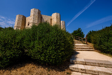 Fototapeta na wymiar Castel del Monte is a 13th-century citadel and castle situated on a hill in Andria in the Apulia region of southeast Italy. The site is protected as a World Heritage Site by Unesco.