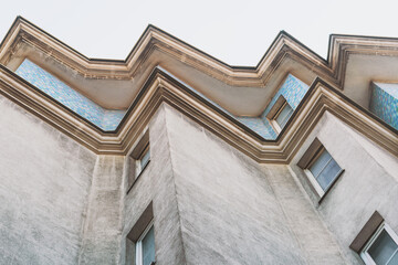 The facade of a residential multi storey building with a zigzag shape