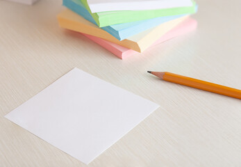Blank note paper and yellow graphite pencils on office desk table. copy space