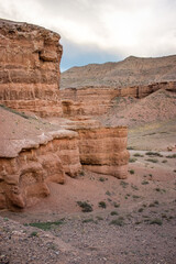 Red canyon valley. Beautiful desert landscape with sand, rocks and hills. National park summer view