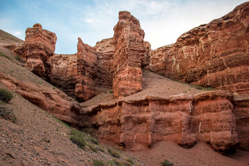 Fototapeta premium Red canyon valley. Beautiful desert landscape with sand, rocks and hills. National park summer view