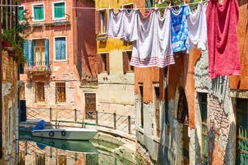 Fototapeta na wymiar Colorful side canal in Venice