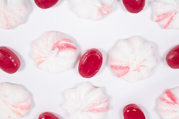 A variety of candies on a white background.