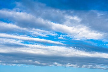 Beautiful blue sky with dramatic clouds. Weather nature cloud background.