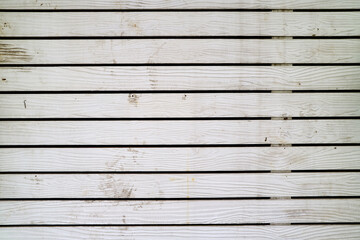 Obraz premium White colored old wooden wall for background or banner