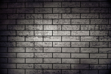 Wall with a bright middle and dark sides.