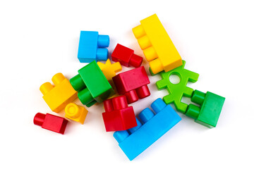 Lot of colorful rainbow toy bricks background. Educational toy, constructor for children Isolated on white background. 3D Rendering. Top view with copy space.