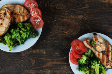 red fish, broccoli and tomatoes, the concept of proper nutrition