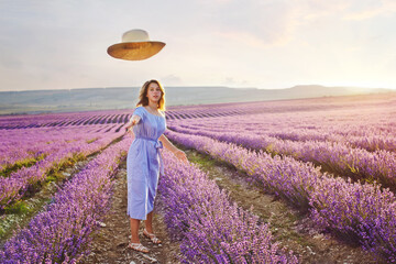 pretty teen girl walking in lavender field