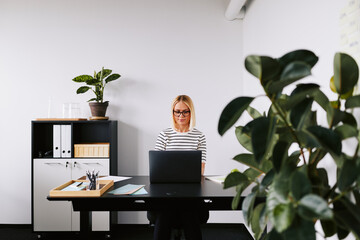 Businesswoman working on a laptop