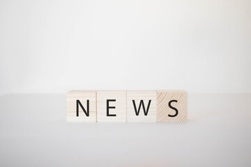 Wooden news sign on a white background