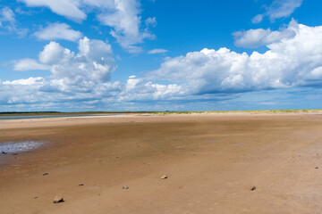 A view of the sands across Budle Bay towards Lindisfarne in Northumberland