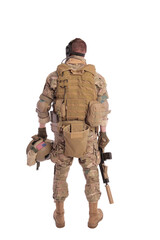 Portrait Of A Soldier Holding Gun against a white background. isolated. u.s. soldier. view from the...