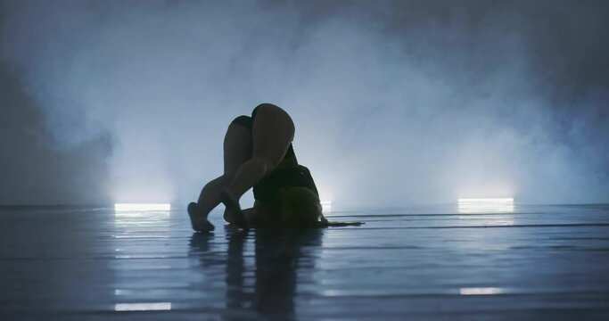 Contemporary dancing performers in dance practice class