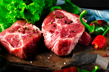 Raw meat beef marble steak with spices and vegetables