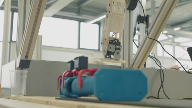 Miniature robotic leg test, oscillating back and forth on a testbench