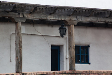 Southwest style building with adobe and wood