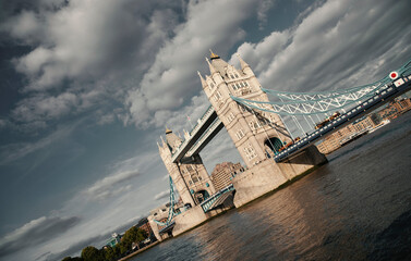 Tower Bridge on the River Thames with a vintage photography look - London, UK - September 2013