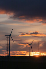 wind turbines at sunset
