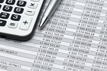 business office desk closeup - financial reports, analysis and accounting, set of documents, tables and graphs, various items for bookkeeping, calculator