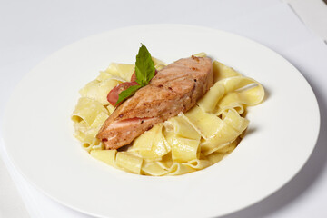 Salmon steak with pasta