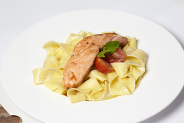 Salmon steak with pasta