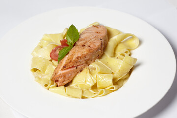 Salmon steak with pasta