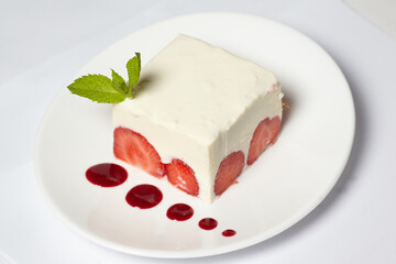 Cake with strawberry on the table
