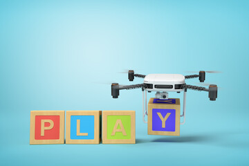 3d rendering of four colorful ABC blocks forming word 'PLAY', quadcopter with camera putting final letter Y at the end, on light blue background.