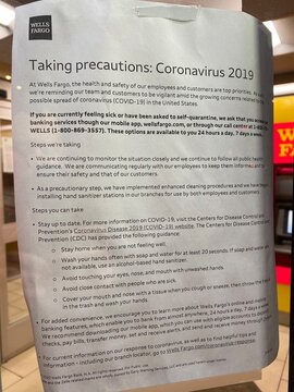 NEW YORK CITY - March 27, 2020: Coronavirus Covid-19 Wells Fargo Sign In Manhattan Says Bank Is Closed As Economy Falls Into Recession And Stores Close. NYSE: WFC