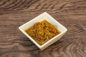 Green spicy sauce in the bowl