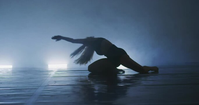 Contemporary dancing performers in dance practice class