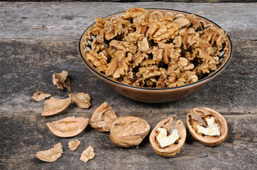 Peeled nuts in a bowl. Front view.