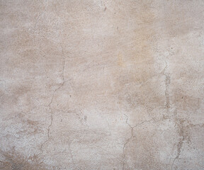 Old worn out painted wall with cracks backdrop