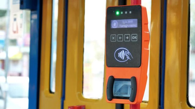 Ticket validator, card reader in public transport. Device for reading and scanning of public transport cards to pay for riding in public transport